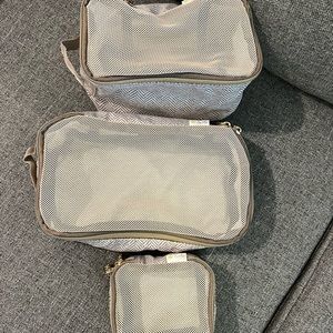 Itzy Ritzy Pack Like a Boss Packing Cubes in Taupe Herringbone